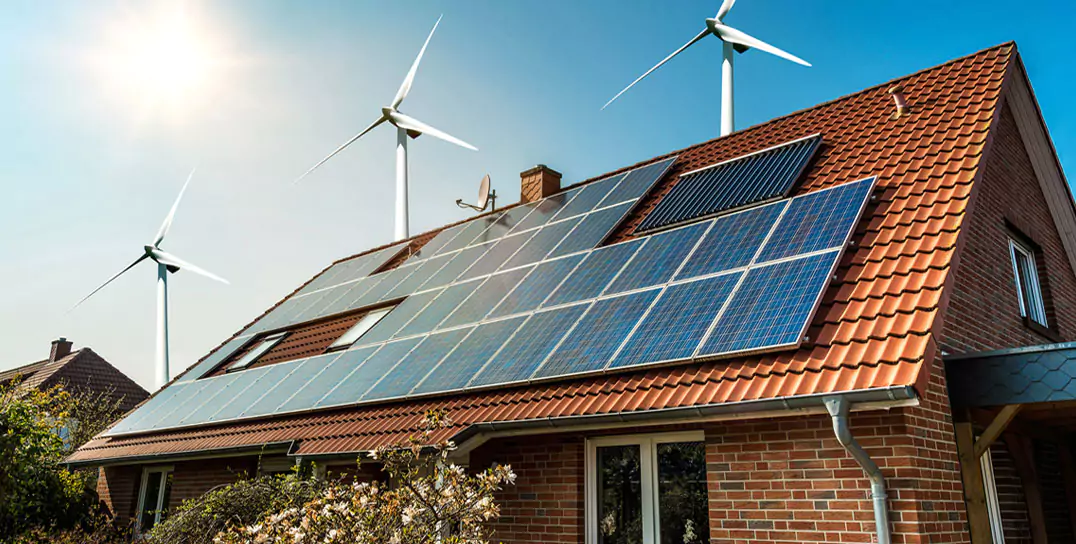 a roof with PV panels and wind power stations