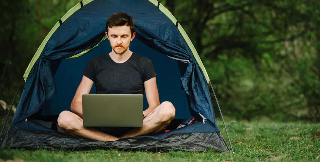 a man working with a computers